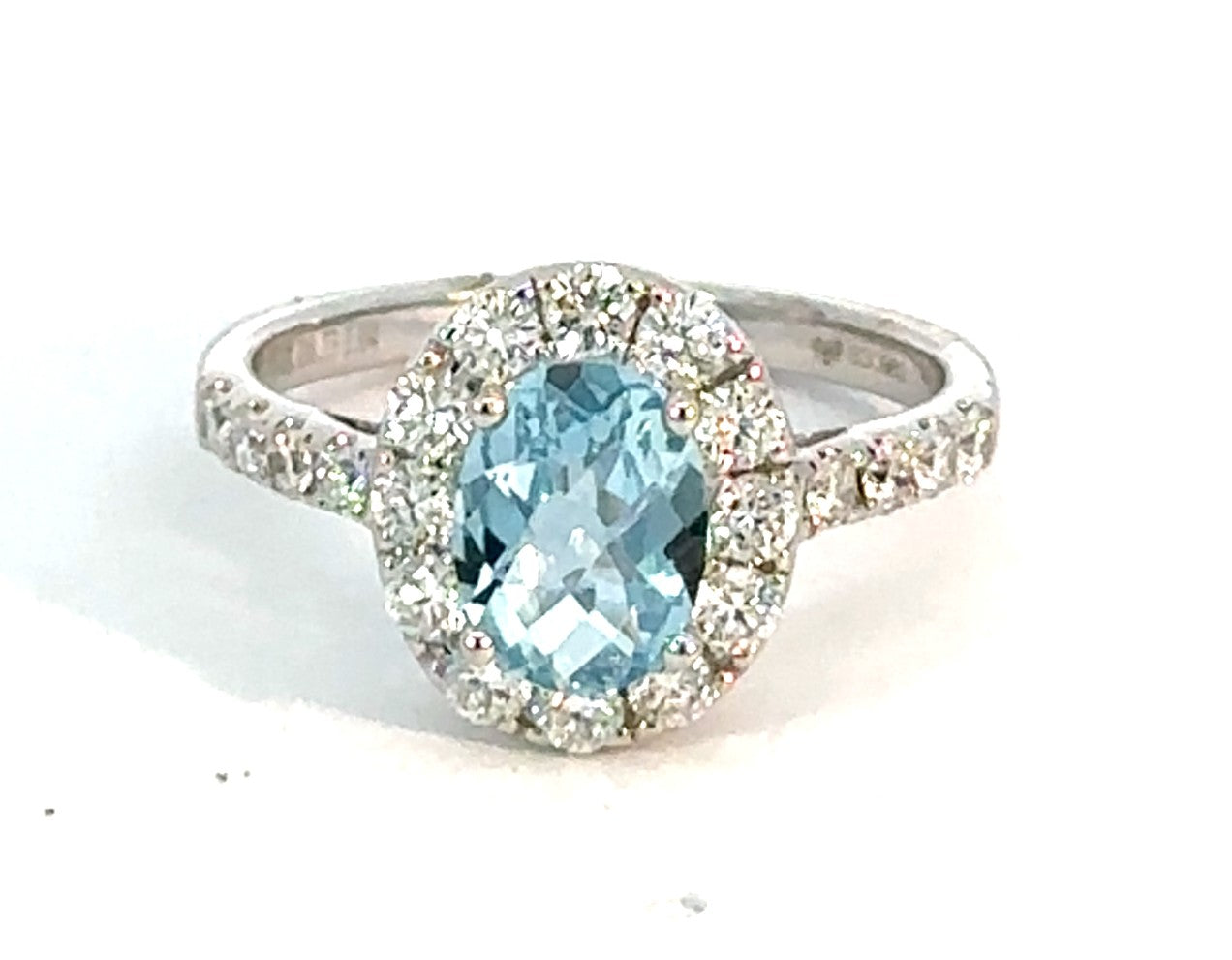 14KW Oval Aquamarine and Diamond Halo Fashion Ring