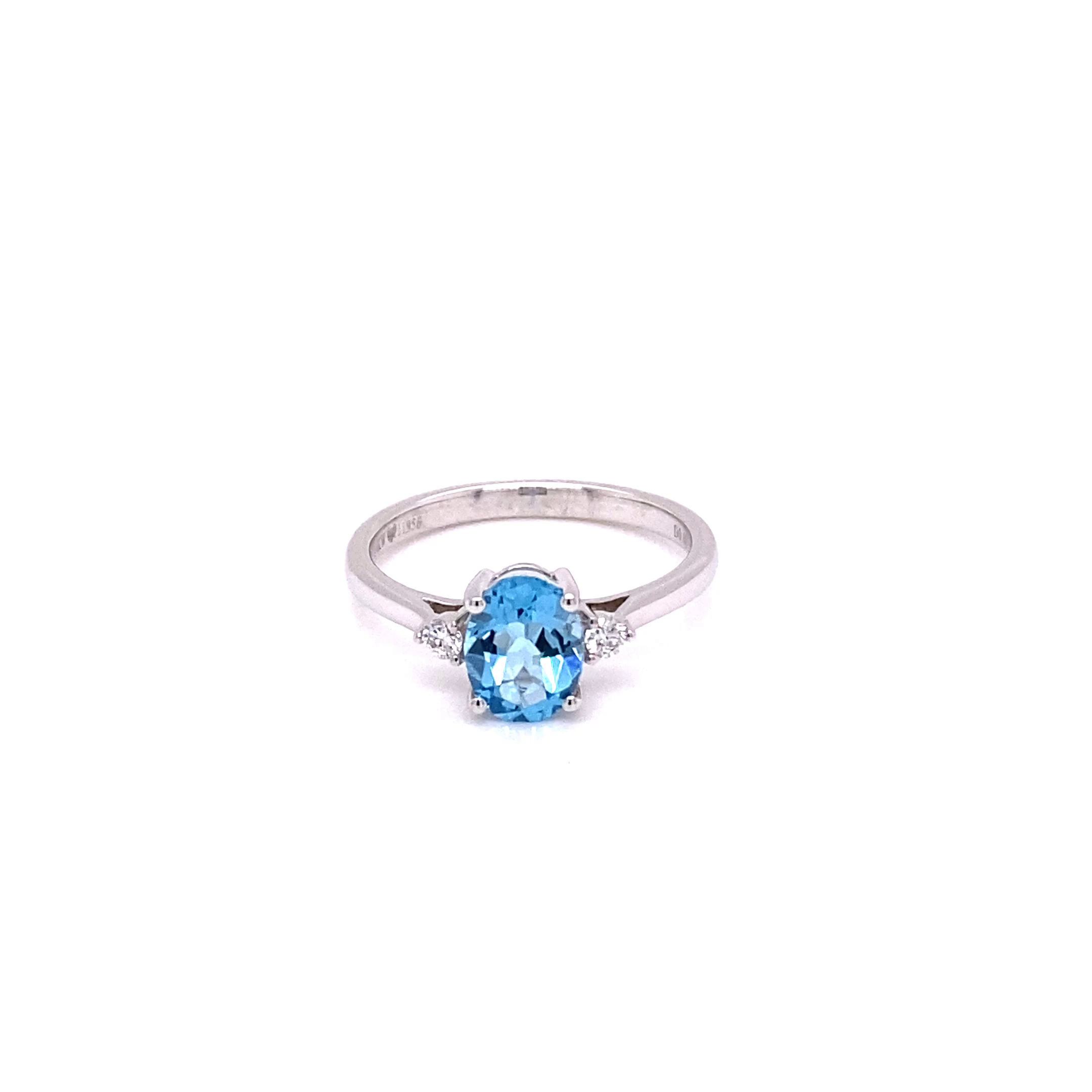 14KW Oval Blue Topaz With Diamonds Fashion Ring