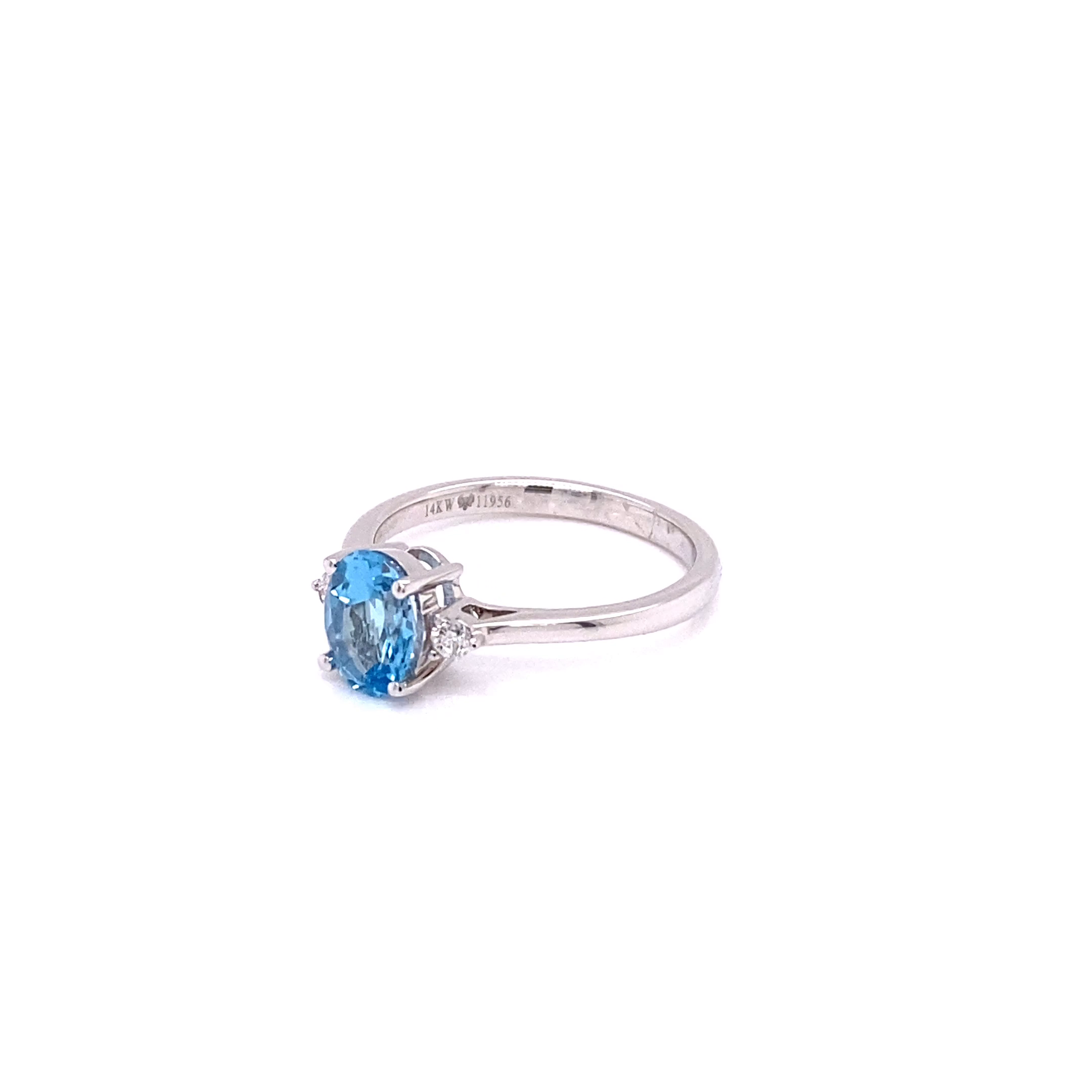 14KW Oval Blue Topaz With Diamonds Fashion Ring